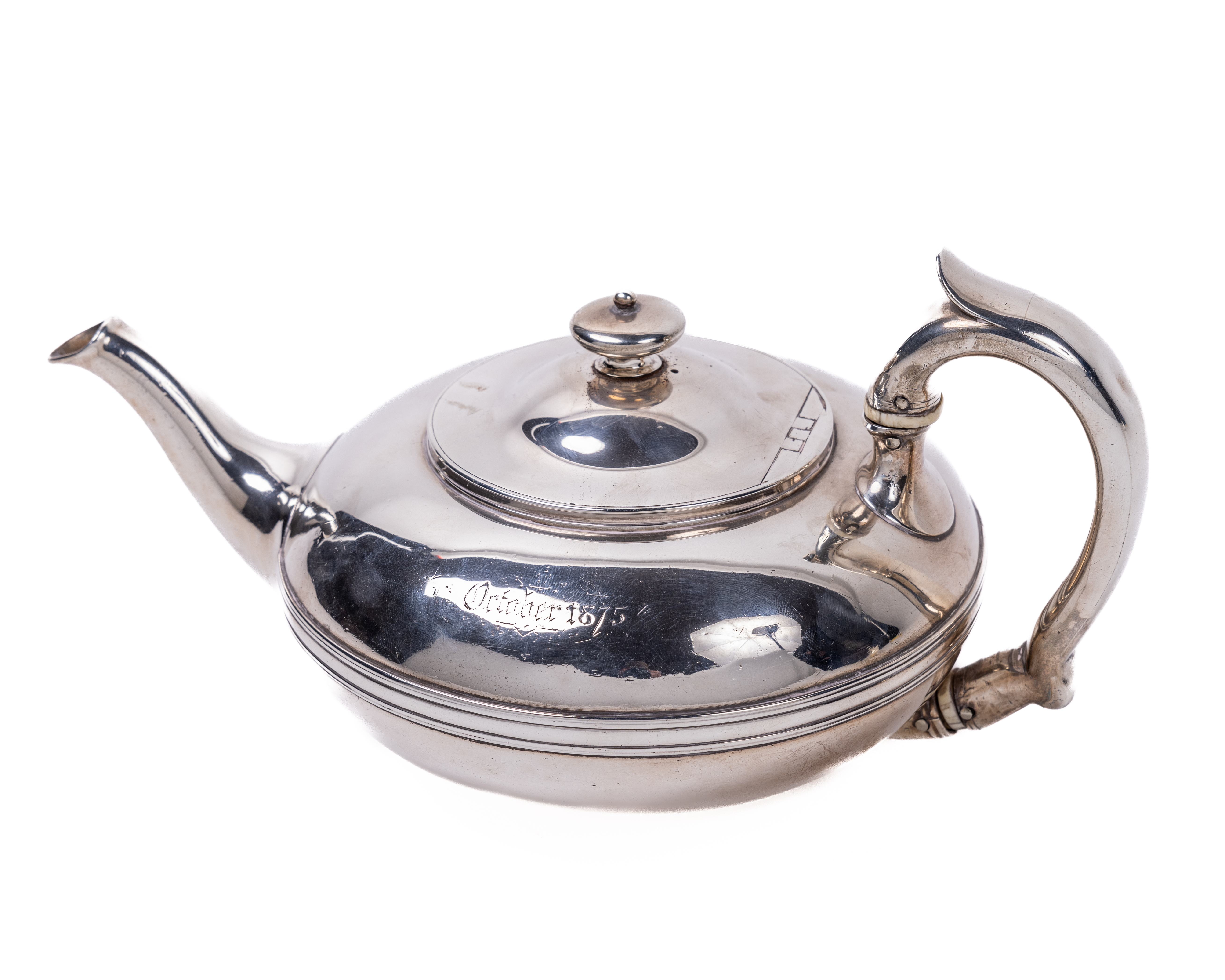 An English silver Teapot, of circular or spherical form, by Garrards, London 1822, the hinged lid