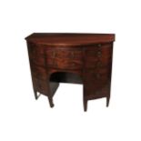An unusual Georgian period Irish mahogany bow fronted Cabinet, possibly Cork, of narrow proportions,
