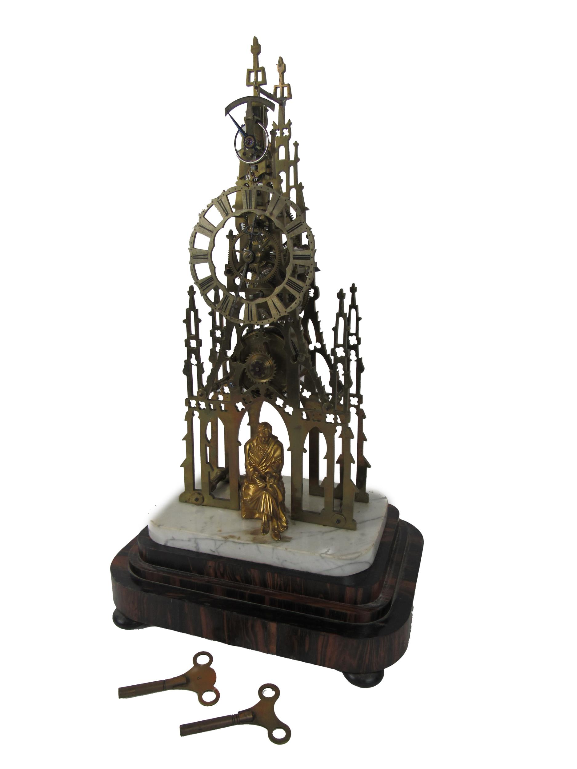 A Victorian brass 'Sir Walter Scott' Memorial Skeleton Clock, with central spire, crochets and an