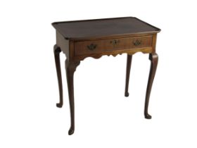An Irish Georgian period mahogany tray top or Silver Table, the hollow top with shaped border, above