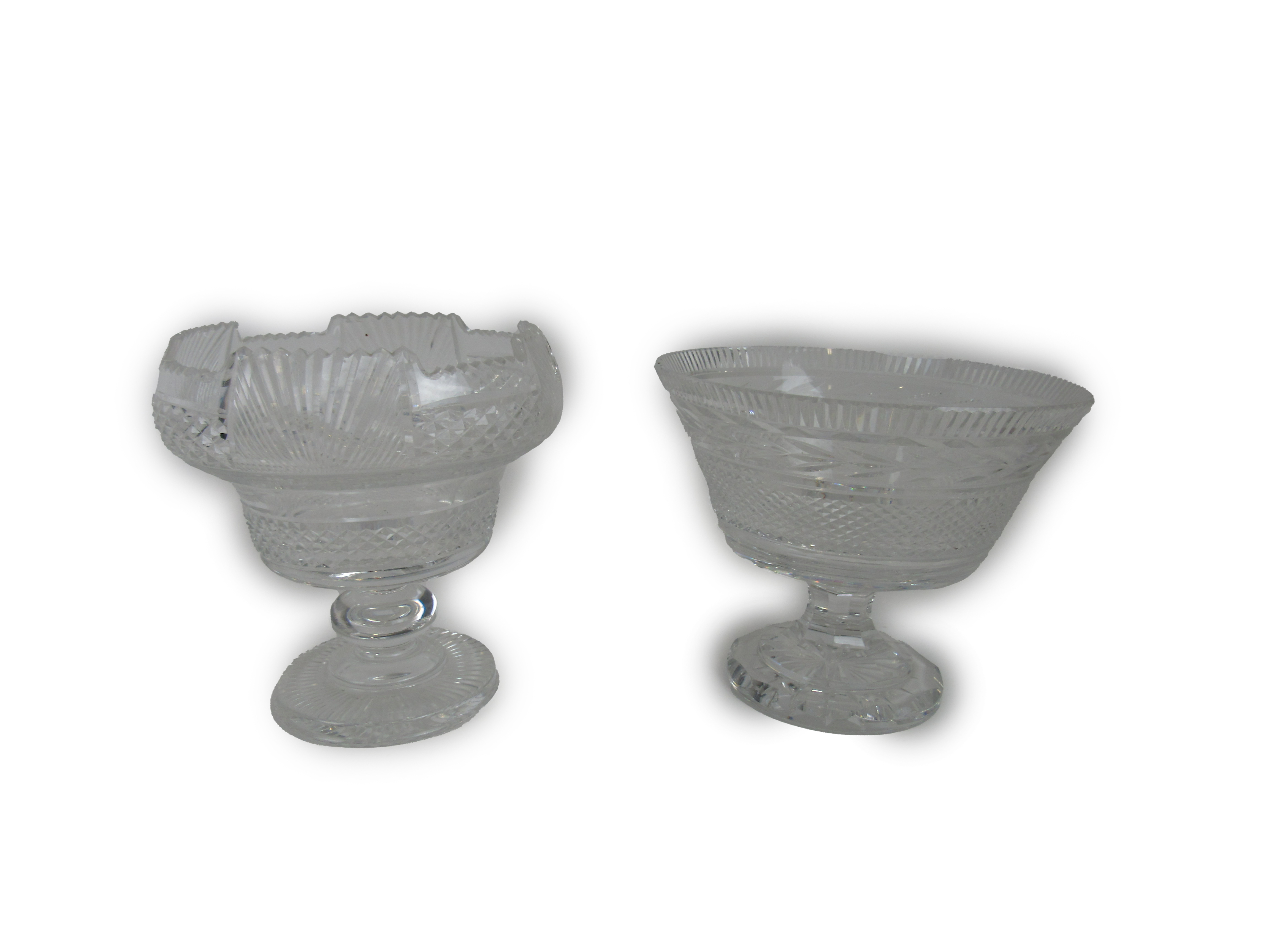 Glassware:  A Waterford cutglass Fruit or Punch Bowl, with serrated and staggered edge on a turned