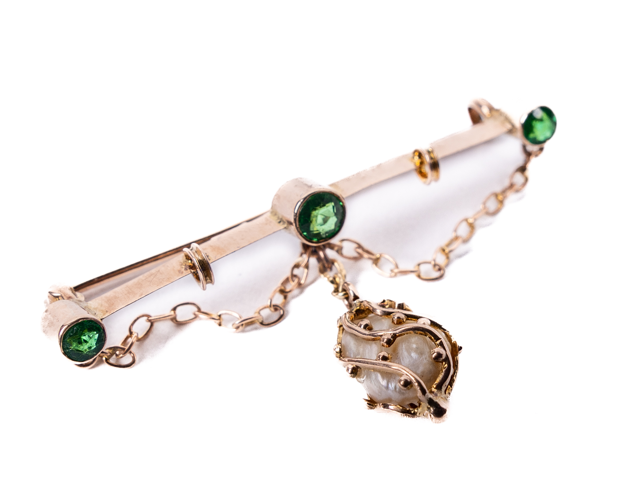 An attractive 9ct gold Ladies Bar Brooch, set with three emerald type stones, and a gold strap fresh