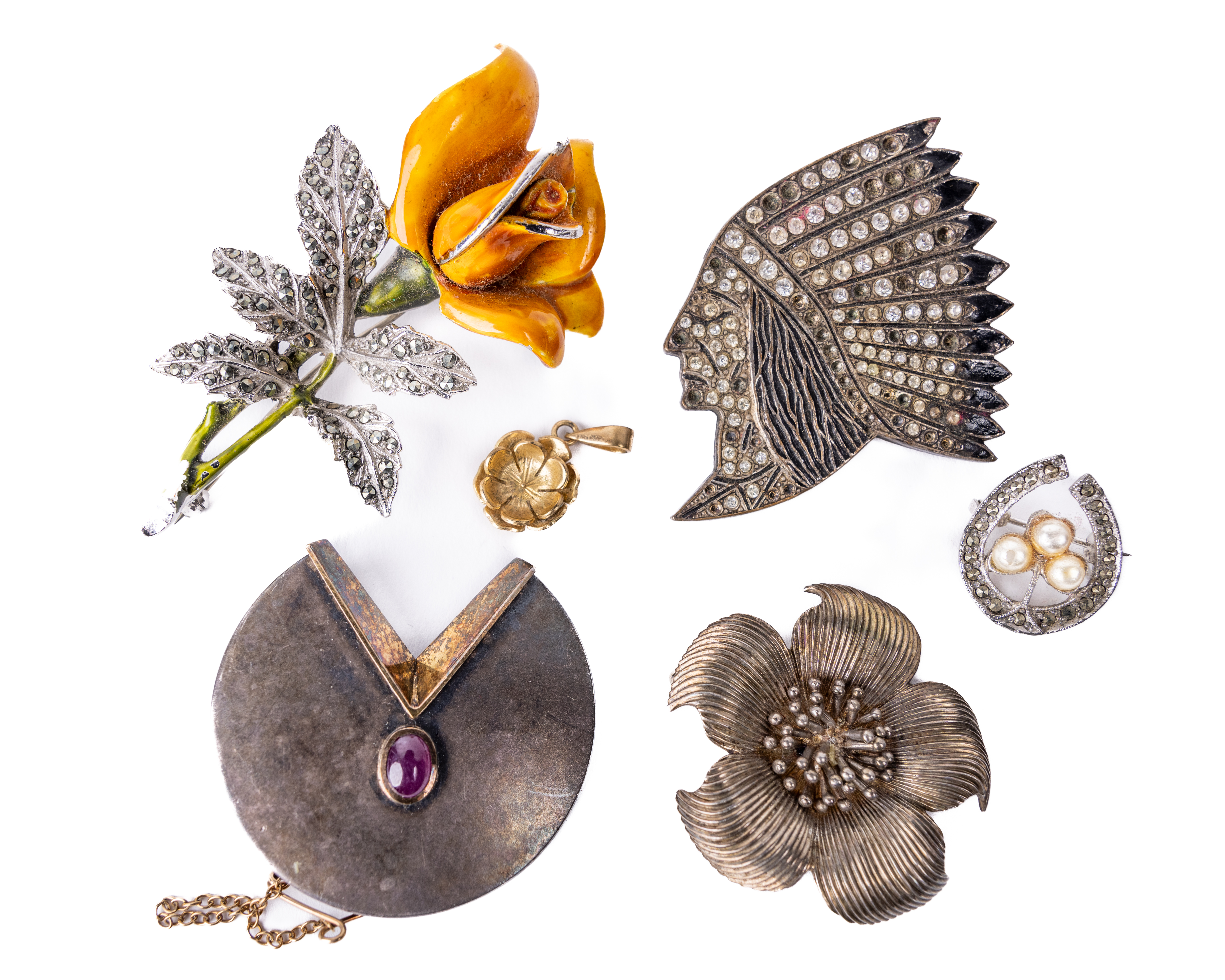 Jewellery: A silver floral design by Tiffany & Co., boxed; a French Brooch modelled as an Indian