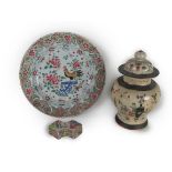A 19th Century Chinese bulbous Urn and Cover, the domed top lid with shaped finial decorated with