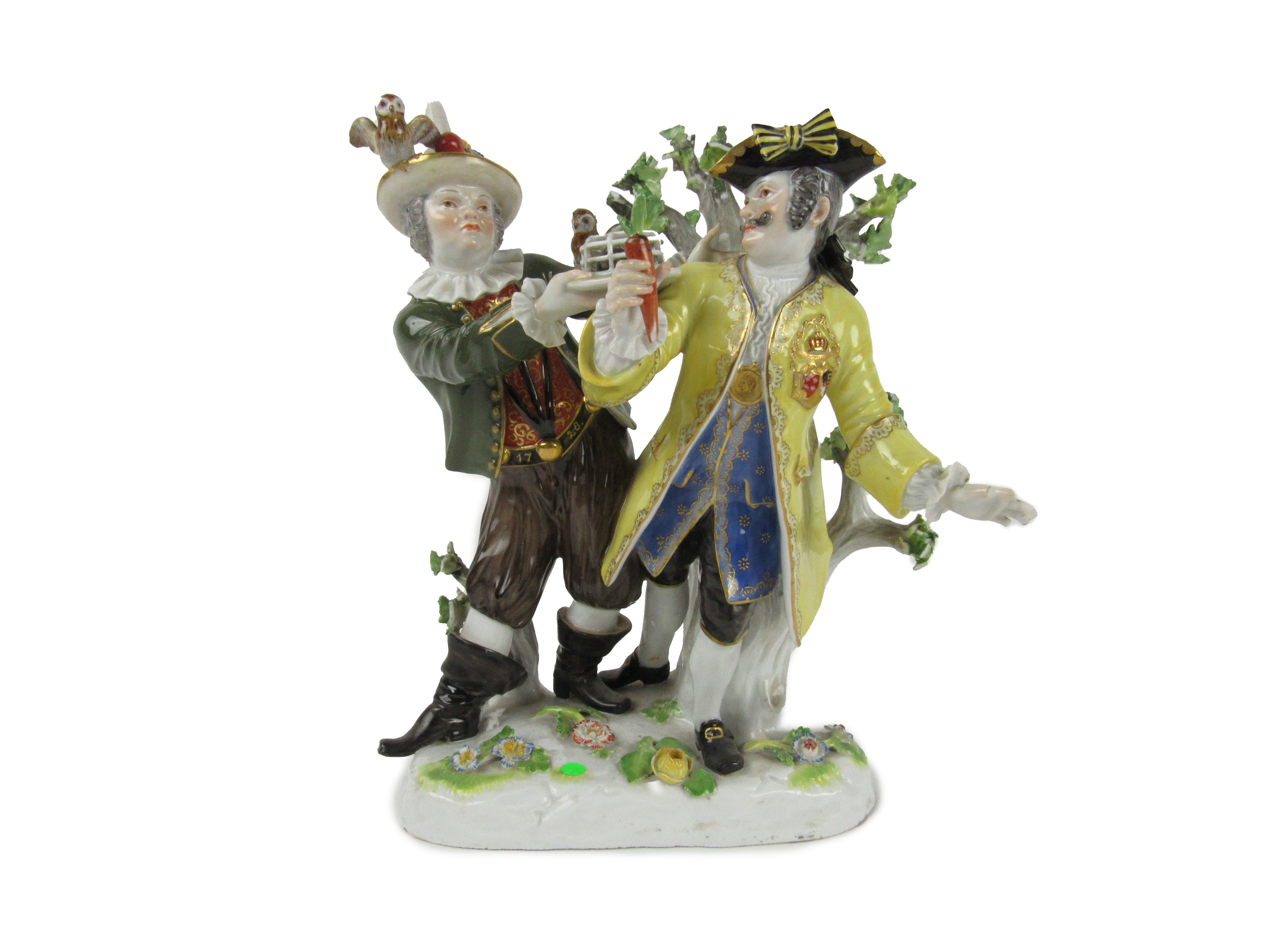A large Meissen Group, with gentleman in bright yellow coat, and a Jester in green coat, offering
