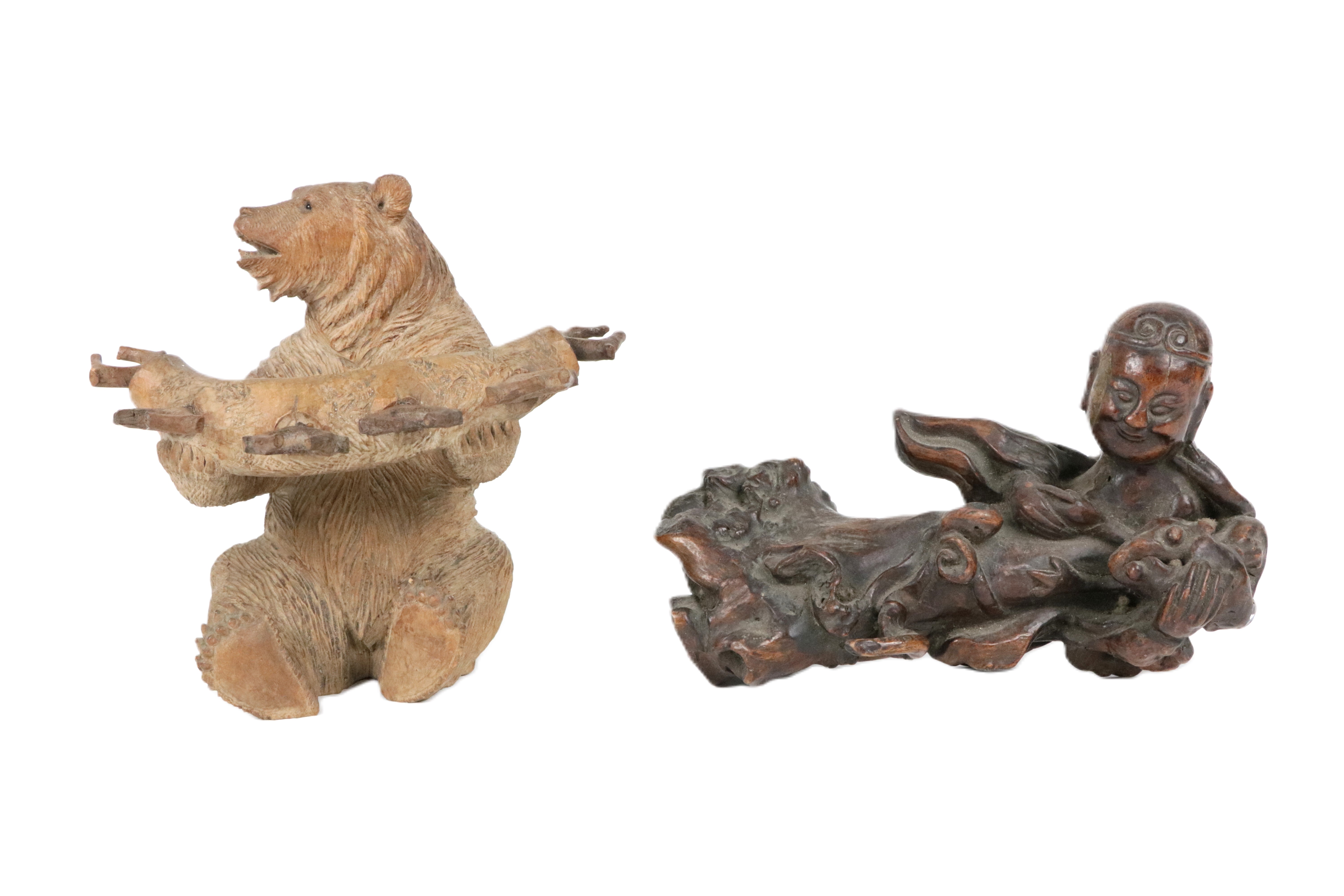 An original carved 'Black Forest' Pipe Holder, modelled as a seated bear; together with a Chinese