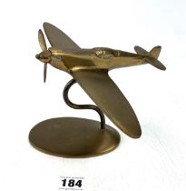 Brass airplane on stand