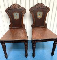 Pair of carved hall chairs