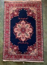 Blue/red/cream patterned rug