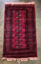 Red/black patterned rug