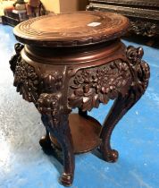 Carved oriental stand