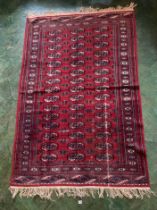 Red/white patterned rug