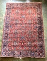 Red/blue patterned rug