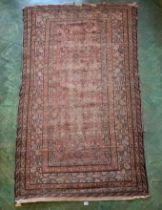 Red/cream patterned rug
