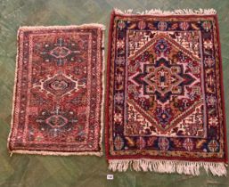 2 small patterned rugs