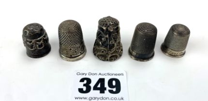 5 silver thimbles