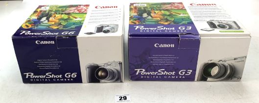 2 Canon digital cameras