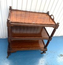 Carved serving trolley