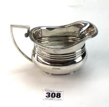 Silver milk jug