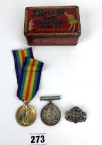 2 WW1 medals and cap badge