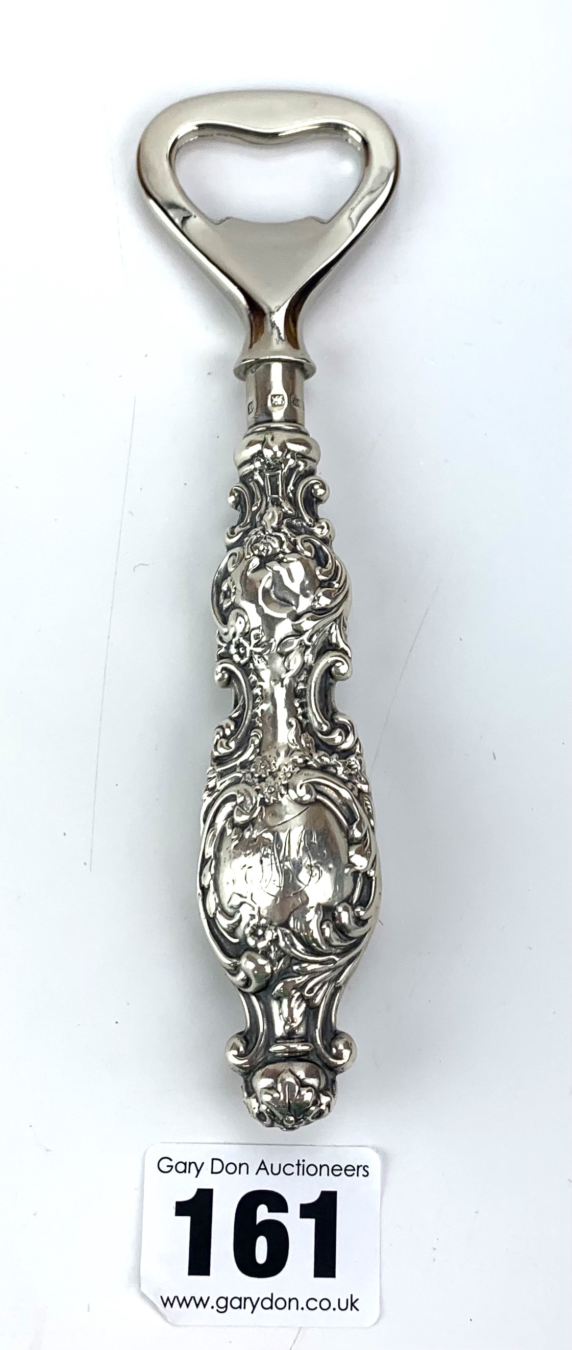 Silver handled bottle opener