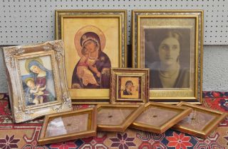 Group of Russian icon prints in decorative frames, largest 14" x 10.25" overall; together with a