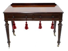 Victorian mahogany writing table, the moulded top over two short drawers raised on four turned and