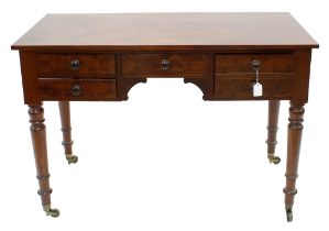 Victorian mahogany writing desk, the plain top over a knee hole frieze and short drawers, raised