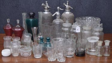 Assorted vintage glass items including a pair of metal mounted vintage soda syphons, another soda