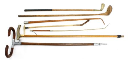 Hermès Paris leather riding crop, 26" long; together with a leather and braid crop by Swaine &