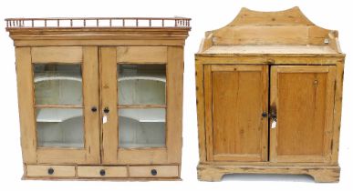 Pine kitchen cabinet, with a gallery rail cornice over two glazed cabinet doors enclosing shaped