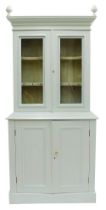 Tall painted pine cabinet, the upper with two glazed cabinet doors enclosing a shaped shelved