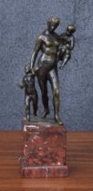 Bronze figural group, after the antique -  a maiden carrying a child, with another child by her