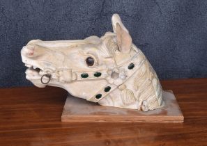 Carved wooden horse head bust sculpture, with glass eyes and half with simulated gem stone