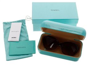 Tiffany & Co. model TF4098 sunglasses, made in Italy, the frame in 'Havana' colourway, with gold