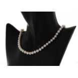 Good cultured pearl necklace with a 14ct yellow gold clasp, the pearls of nice lustre 7mm approx,