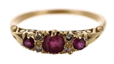 Pretty 18ct claw set ruby and diamond yellow gold ring, with three round rubies and four small