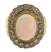 Good 18ct yellow gold cabouchon opal and diamond ring, the opal 3.25ct approx in a setting of