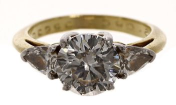 Tiffany & Co. 18ct and platinum three stone diamond ring with a GIA certificate, the centre