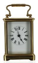 Small carriage clock timepiece within a corniche brass case, 4.75" high (key)