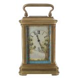 Miniature contemporary carriage clock timepiece with painted porcelain panels, the movement back