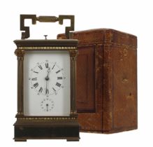 Large repeater carriage clock with alarm, the movement striking on a gong, within a Corinthian