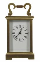 French carriage clock timepiece, within a brass case, 6" high (key)