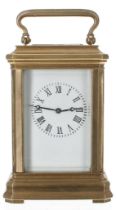 Miniature contemporary carriage clock timepiece, the movement back plate and base stamped no.