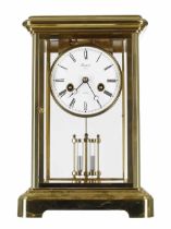 Modern Rapport of London eight day brass four glass two train mantel clock striking on a bell,