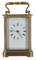French brass carriage clock striking on a bell, within a corniche brass case, 6.5" high (key);