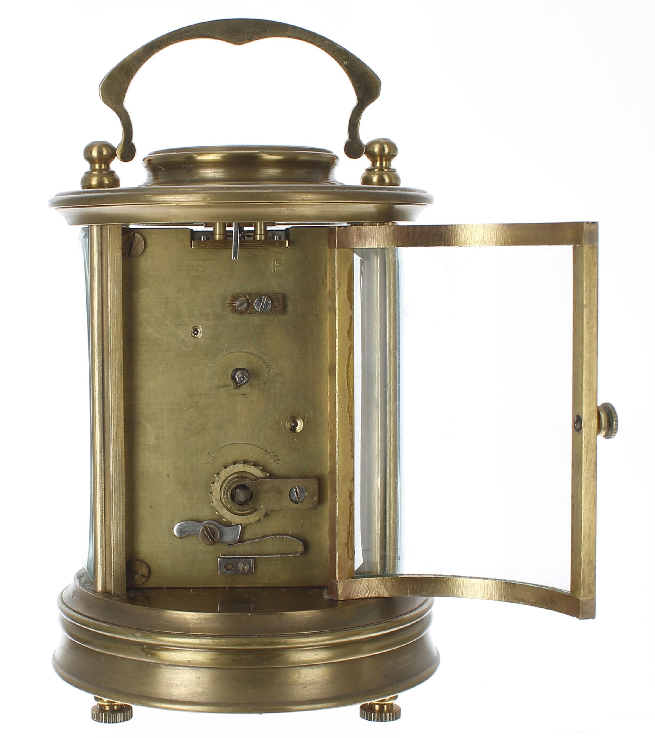 Carriage clock timepiece, within a circular bevelled glazed brass case, 6.75" high - Image 3 of 3