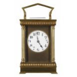 Carriage clock striking on a gong, the 2.25" white dial within a gilt mask and architectural