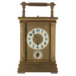Good repeater carriage clock with alarm, the movement striking with two hammers on a gong, the 2.25"