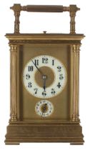 Good repeater carriage clock with alarm, the movement striking with two hammers on a gong, the 2.25"